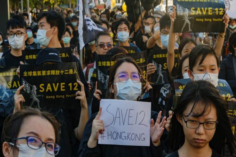  Hong Kong pro-democracy activists caught at sea go on trial in China under National Security Law