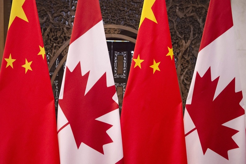 canada says will stay watchful in ties with china