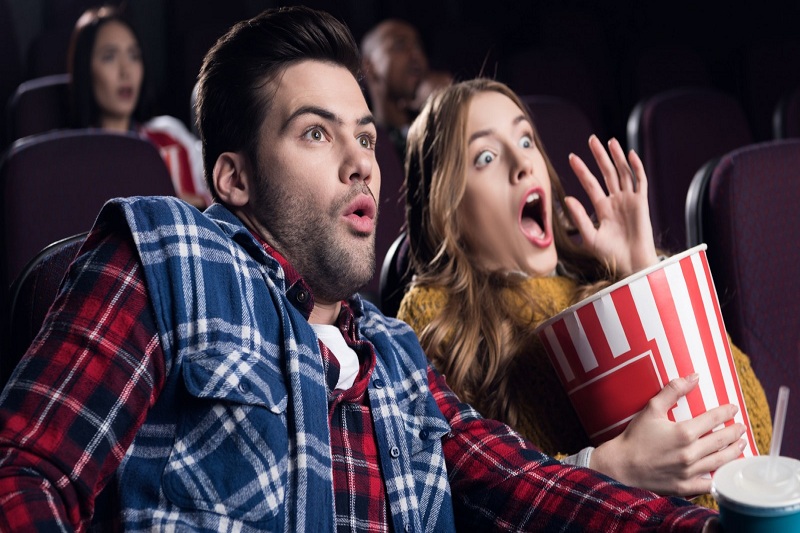 us company pays to watch horror movies