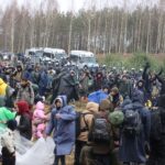 migrants gather on the belarusian polish border