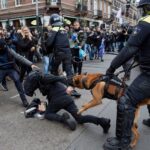 dutch police clash with anti lockdown protesters in amsterdam