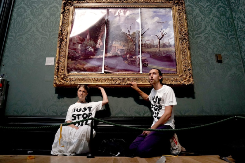 Climate change protesters glue themselves to 200-year-old artwork