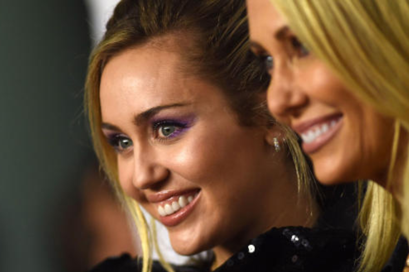 miley cyrus is maid of honor at mom’s wedding to prison break actor