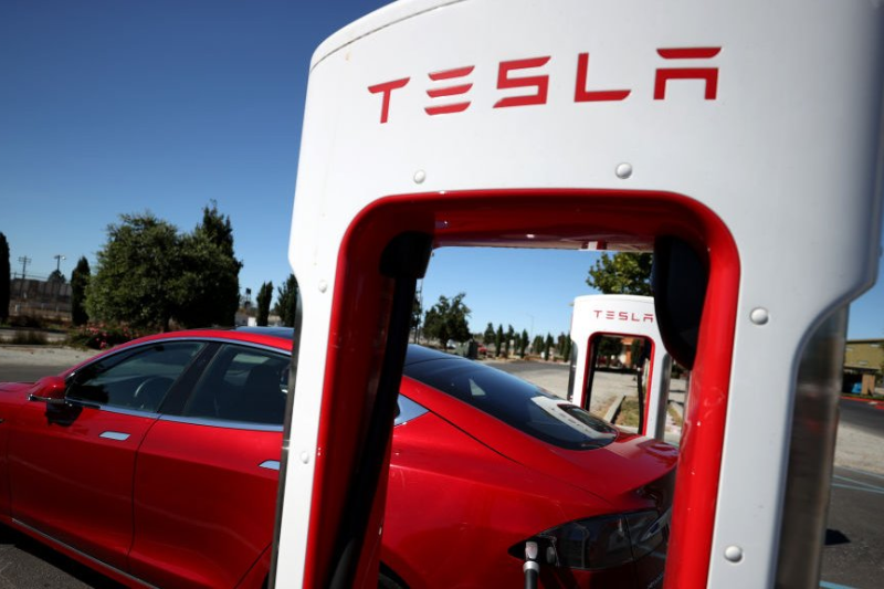 tesla's latest layoffs supercharger team eliminated in wave