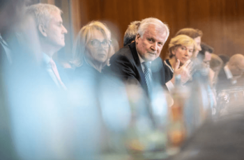 immigration policy freeze legal political storm