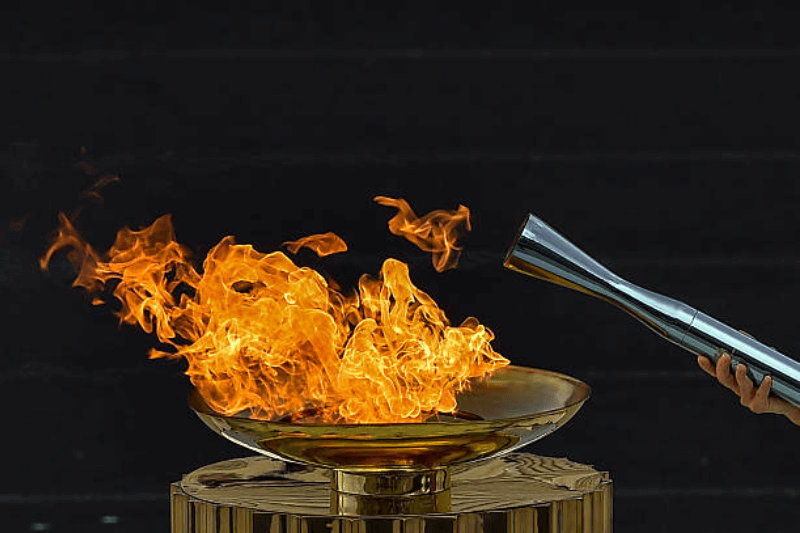 2026 winter olympics flame lit in rome