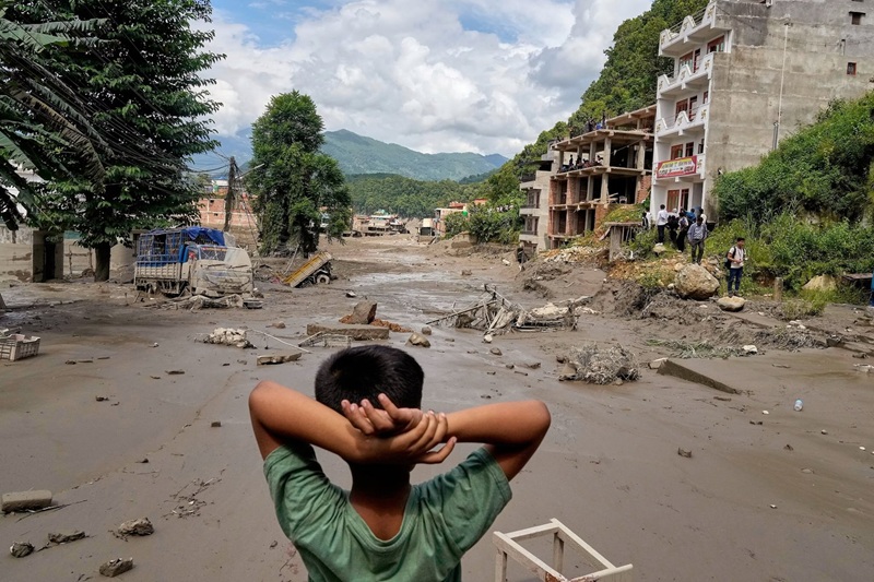 nepal tibet flood death toll 469